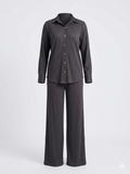 Dark gray shirt and wide-leg pants set on a white background